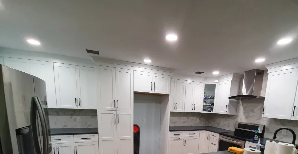 Kitchen remodel with cabinet outlets, recessed lighting, garbage disposal, and breakers